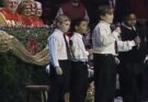 Four boys singing in church is honestly the funniest thing I’ve ever witnessed. Make sure to watch the kid in the vest.